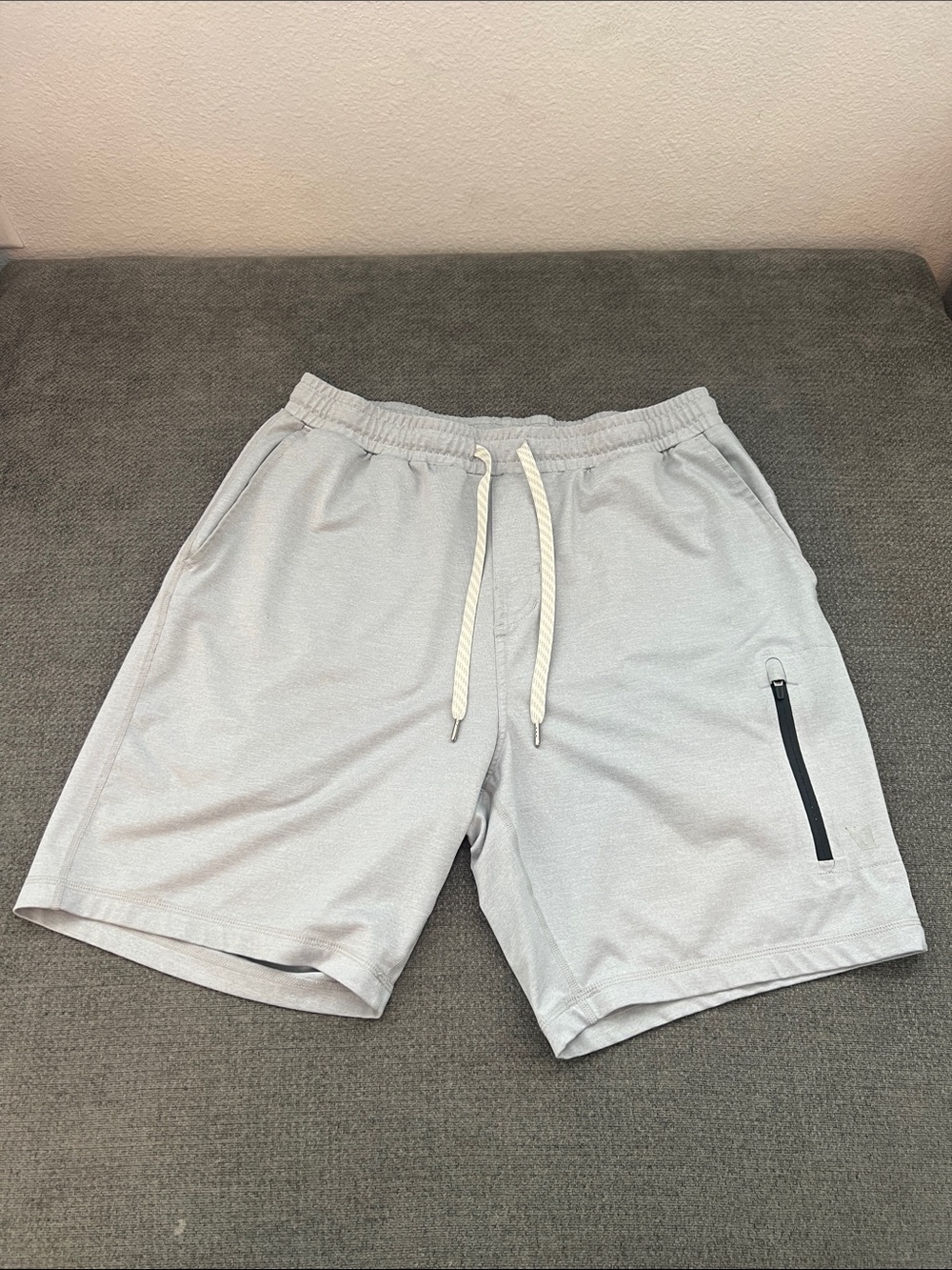 Vuori Light Gray Athletic Shorts with Zippered Pocket